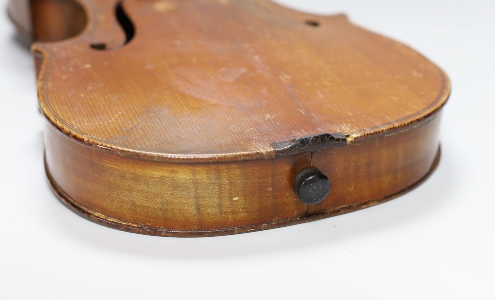 A cased three quarter size violin, labelled E.Coiffier, 56cms long